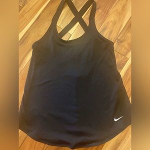 Good condition,very cute, workout tank. It does not fit me anymore.